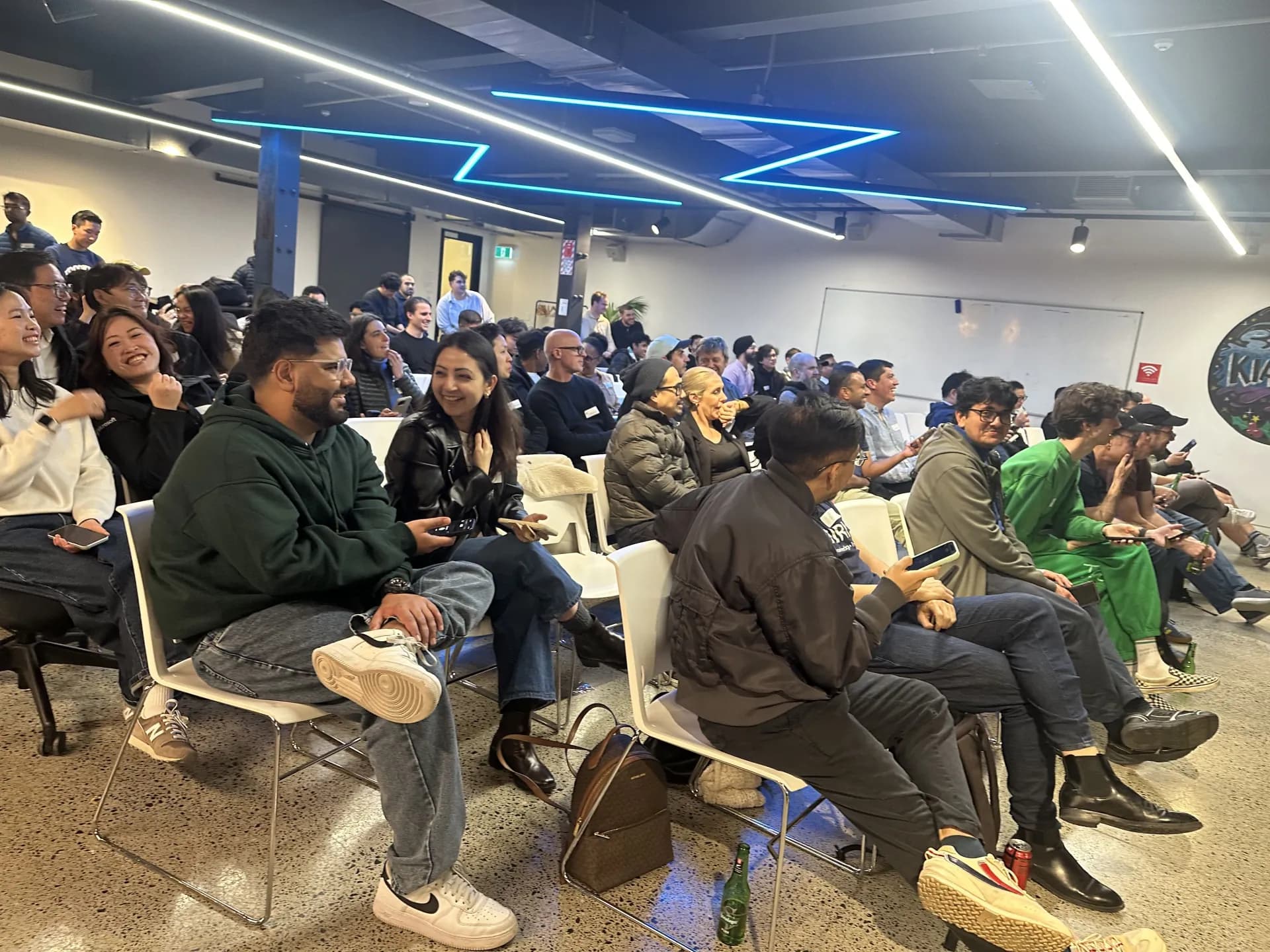 Speaker and audience at Cursor Meetup Auckland