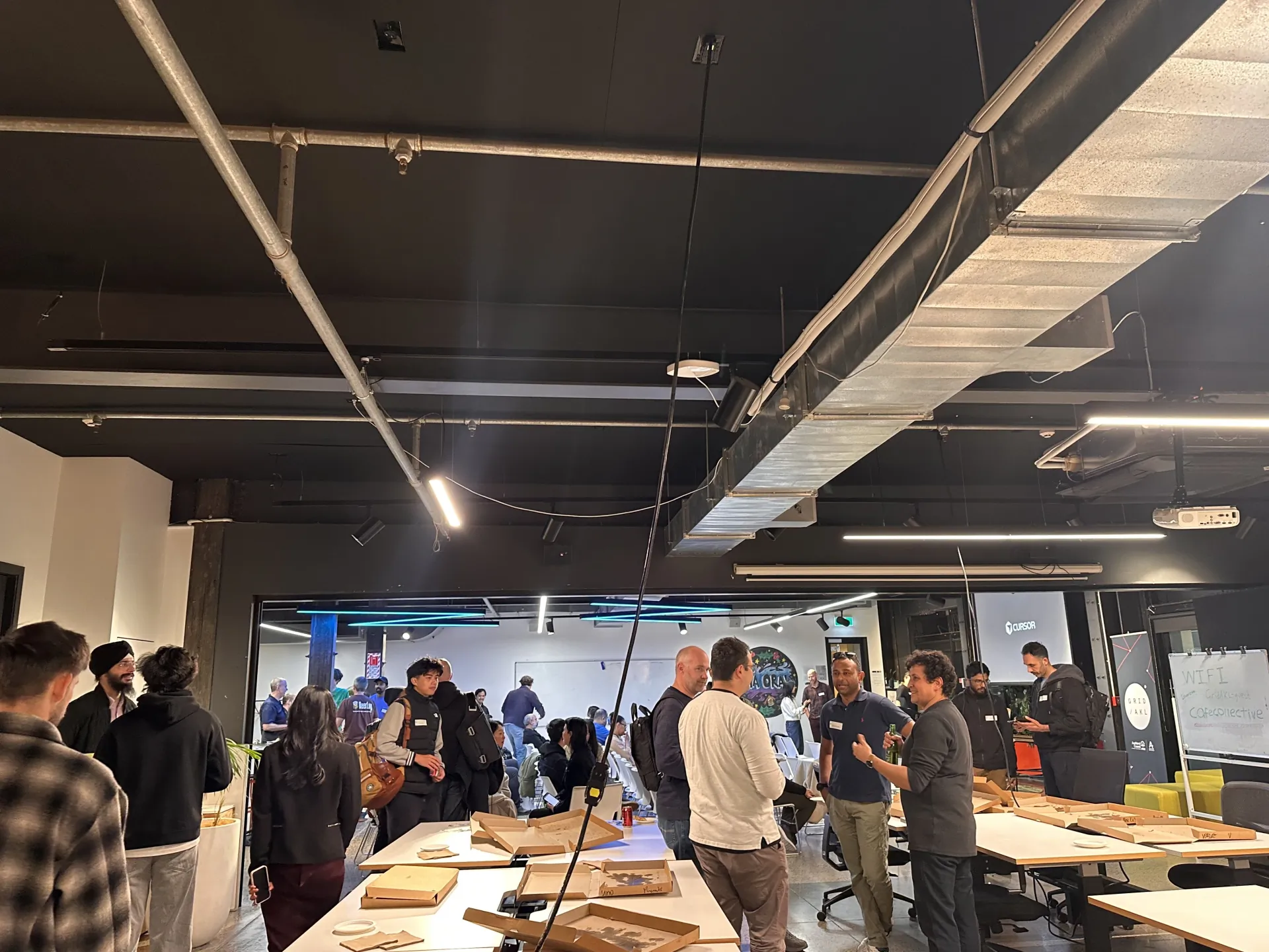 Builders chatting at Cursor Meetup Auckland