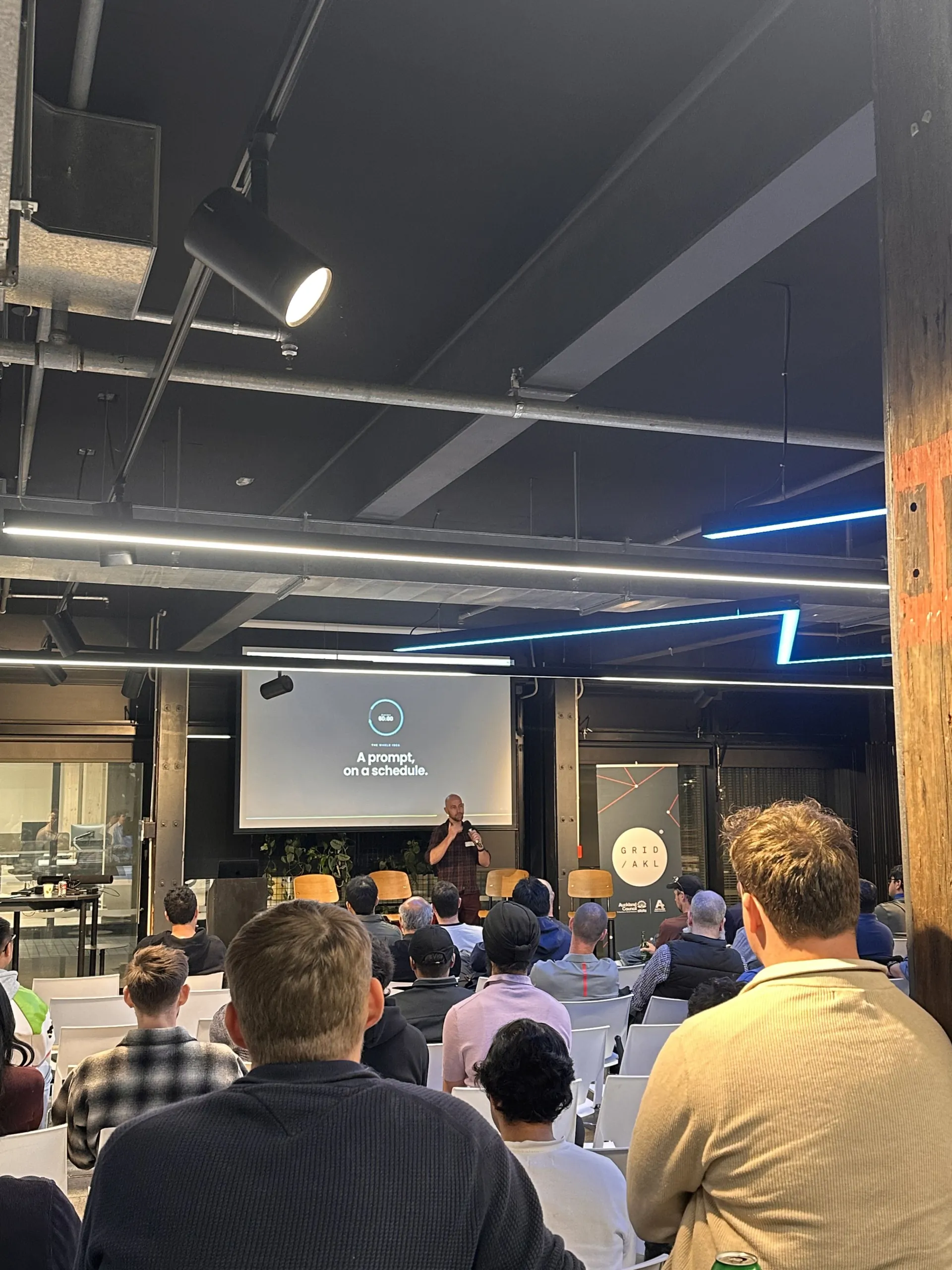 Stage and audience at Cursor Meetup Auckland